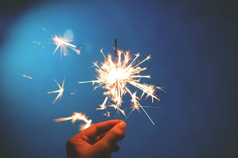 fire safety - person holding sparkler